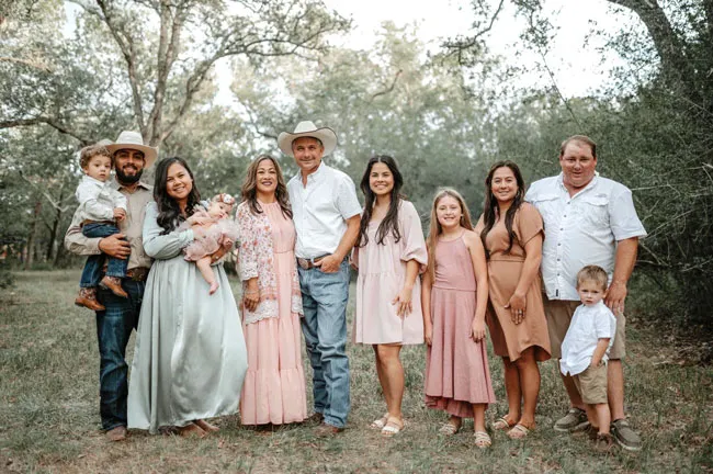 Daniel and Ashley Squyres with family at the ranch
